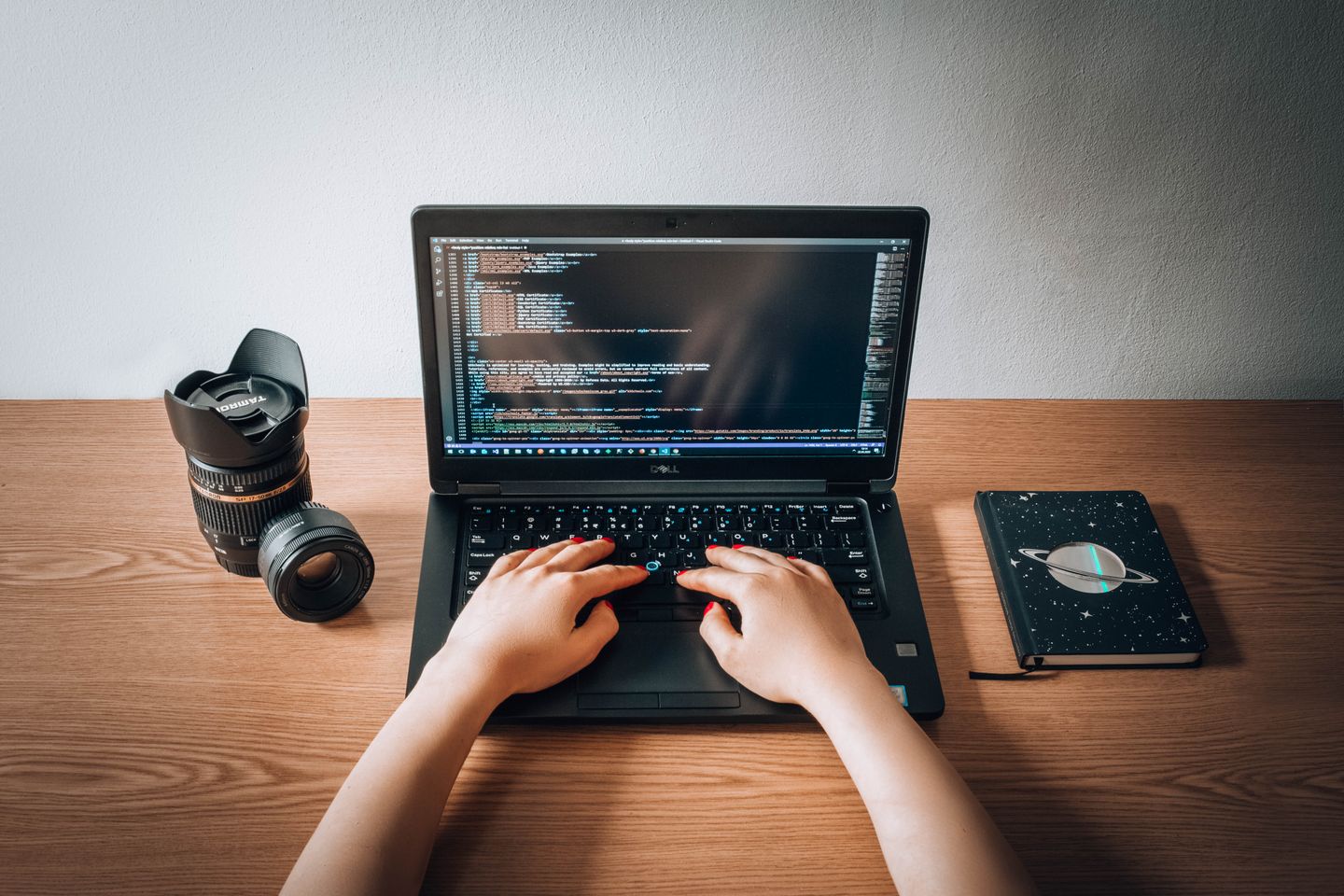 A person working remotely at a laptop in a home-office setting